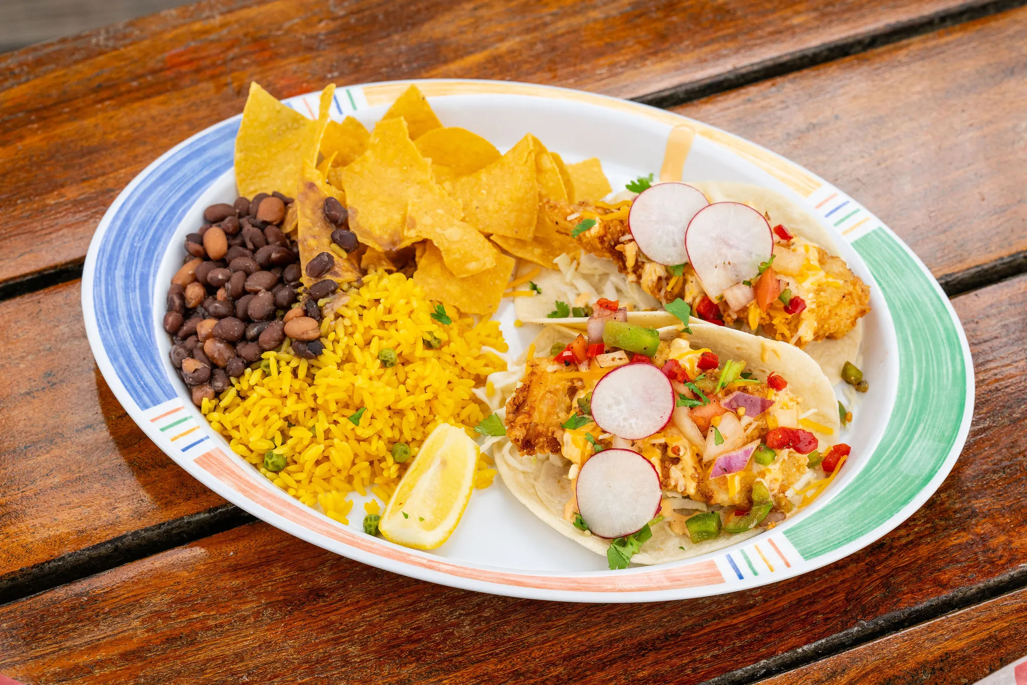 Fish tacos with rice & chips