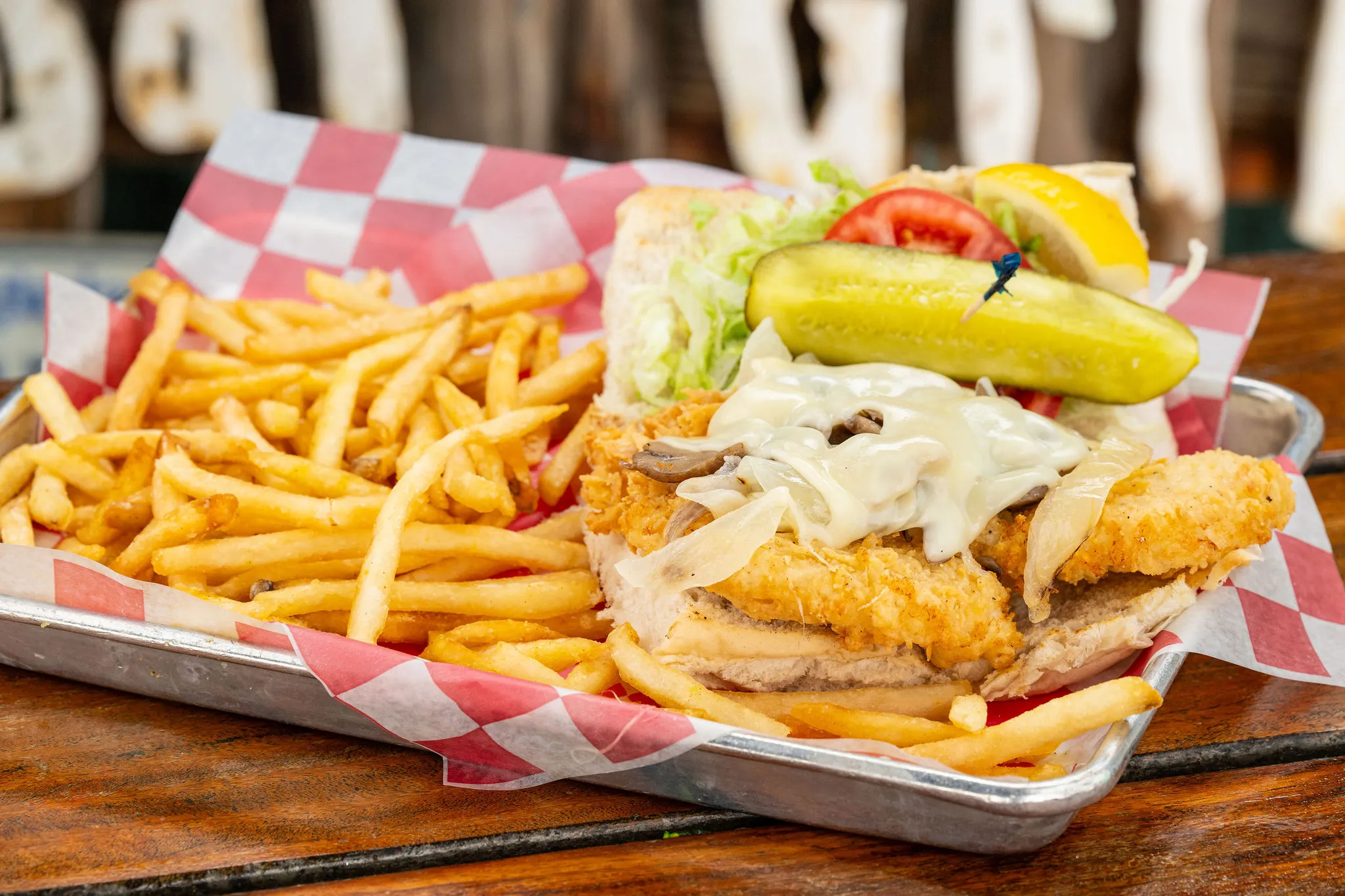 The Killer Hogfish Sandwich: pan-seared hogfish with mushrooms and Swiss on Cuban bread